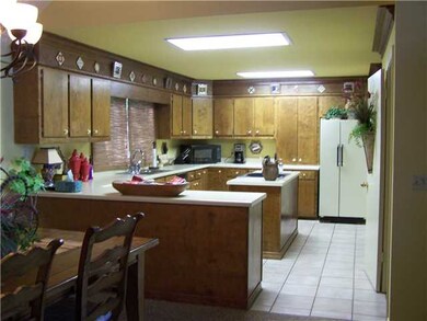 Breakfast bar and island for serving convenience.