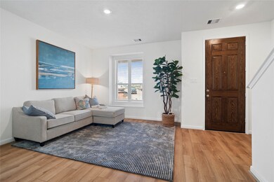 The front formal living room space greets you as y