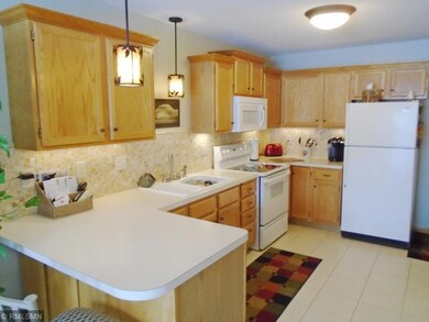 Attractive kitchen with plenty of cabinets and cou