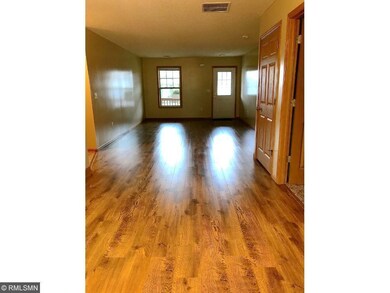 New laminate flooring and fresh paint in the livin