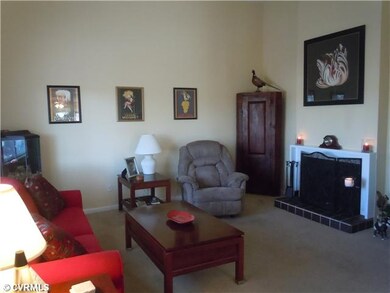 Living Room - Living room with vaulted ceiling and
