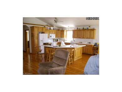 View of kitchen with all appliances and huge islan