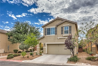 View of front facade featuring stucco siding, an attached garage, concrete driveway, and a tiled roof