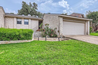View of front of property featuring a front lawn,