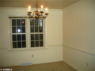 Dining Room - Formal dining room with chair rail a
