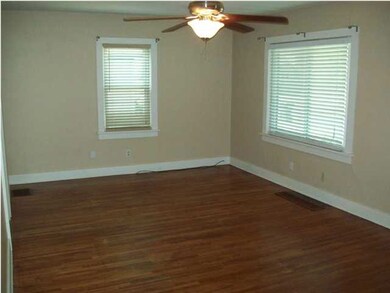 Living Room is spacious with desireable hardwood f