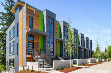 Each unit boasts its own private entrance and a small front yard; all landscaping covered by HOAs. Inside, you'll enjoy three floors of luxurious living space. Note the custom stair rails. Units 6 and 1 are end units so also benefit from all that light and the views coming in from the windows on each side of the building.