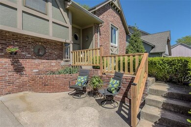 Sit and relax on the cozy front area patio.
