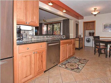 Hickory Custom Cabinets with tile floors.