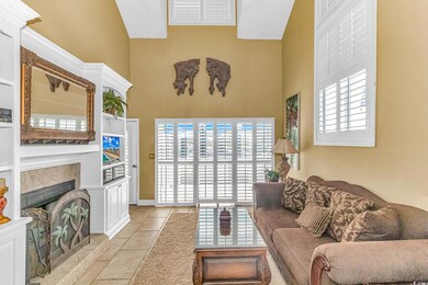Living room featuring a wealth of natural light, a
