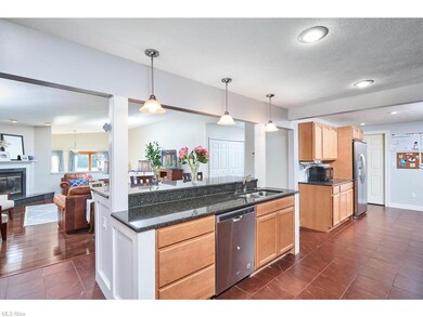 kitchen features granite countertops and includes 