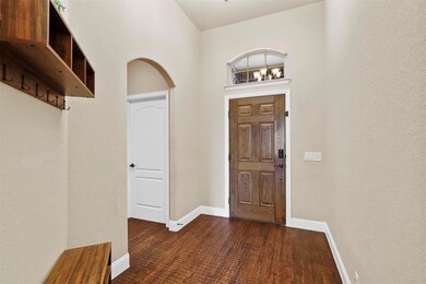 Entryway featuring dark hardwood / wood-style floors