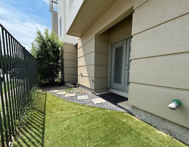 The fully fenced, turfed, yard space can be accessed from the private gate.