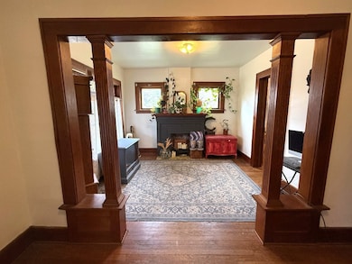 Living Room with Gorgeous Woodwork and Ornamental