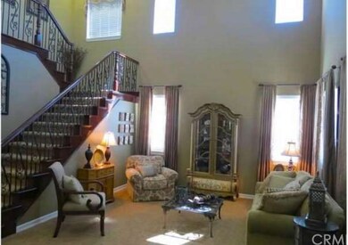 Formal Living room with upgraded carpet and wrough