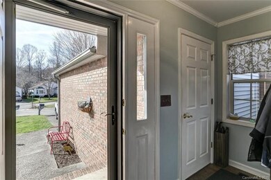 Foyer looking out to driveway. Garage door is to the right