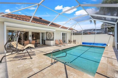 View of swimming pool with a patio area, a covered