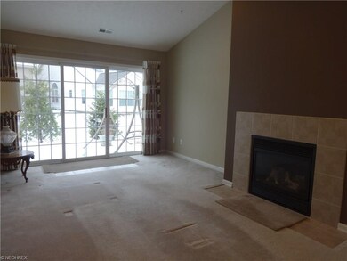 Great room with fireplace and slider to patio