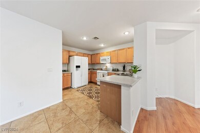 KITCHEN OPEN TO DINING & LIVING AREAS