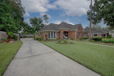 Wonderful long driveway with security gate to the side entry 2 car garage. Fantastic additional parking for your guests when entertaining.