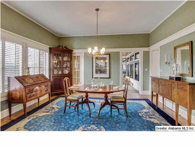 Formal dining room open to grand foyer and living 