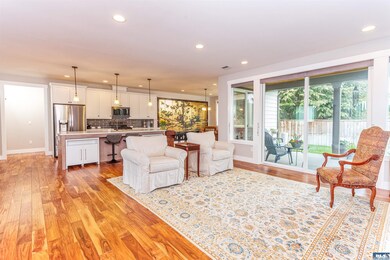 Perfect for entertaining with an open concept, two sliding doors to the covered patio.