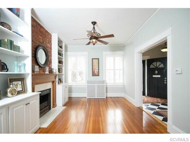 The living room has newly refinished floors, fresh