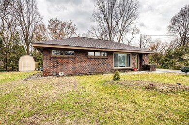 Great curb appeal with the charming brick exterior