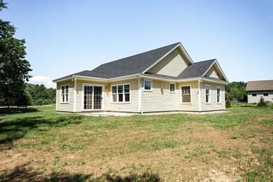 Back side of house faces east with...