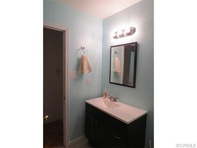 Hall bath -- updated light fixtures.