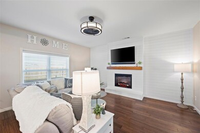 Fireplace and custom wall detail.