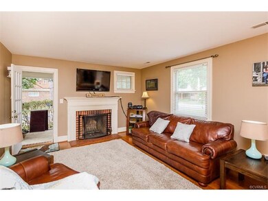 Living Room, Hardwood Floors, view to side porch