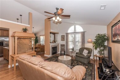 Great Room with Gas Log Fireplace, Palladium windo