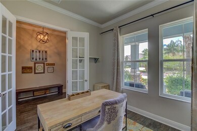 Double entry french doors to the den