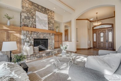 Grand living room provides a warm welcome off the 