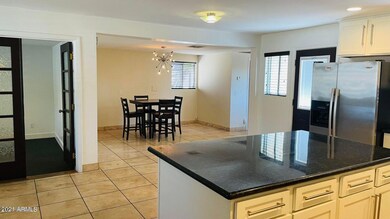 Kitchen is open to dining area