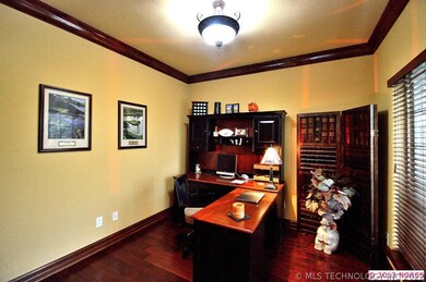 A formal study is off the front entry with handsom