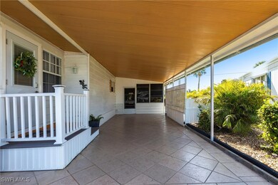 Unfurnished sunroom with lofted ceiling and wooden