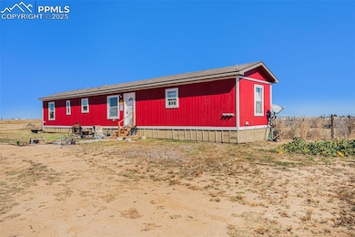 6855 S Lauppe Rd, Yoder, CO 80864 - photo 2
