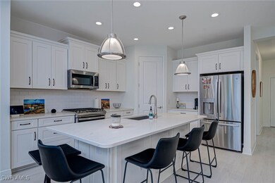 Kitchen featuring appliances with stainless steel
