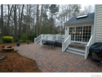 This part of the yard is fully fenced for Fido or 