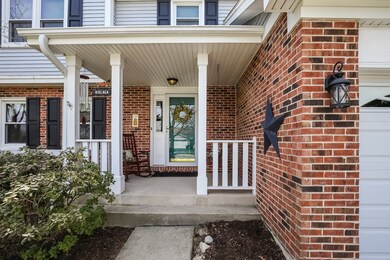 QUAINT COVERED PORCH WITH SWING