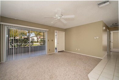 Living area opens to the Lanai thru sliding doors