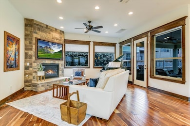 Living area with hardwood / wood-style flooring, 