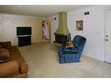Exterior Front. Second View of Living Room showing