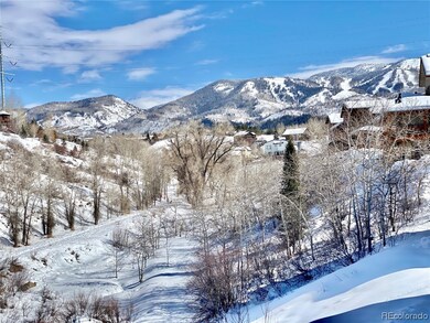 View from deck overlooking green belt and bike trail.