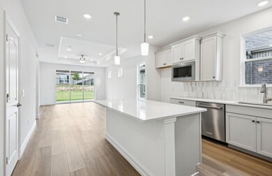 Pendant lighting over island