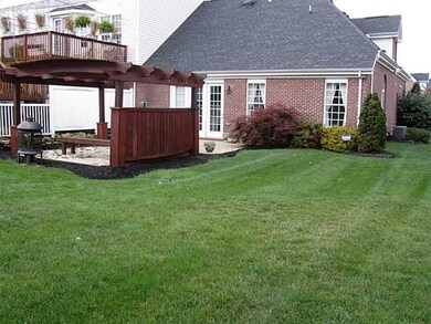 Exterior Back. Large usable yard with patio, fish 