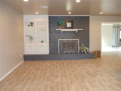 View of living room from front door. New lighting,
