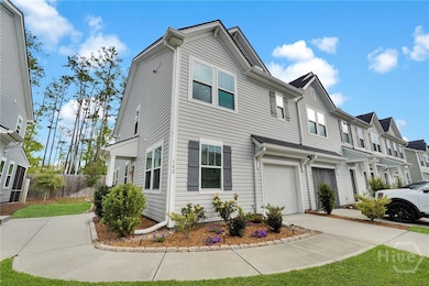 The owner has added beautiful landscaping and pave